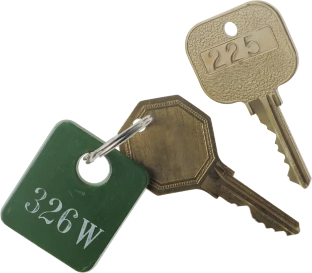 Two numbered brass keys on a ring